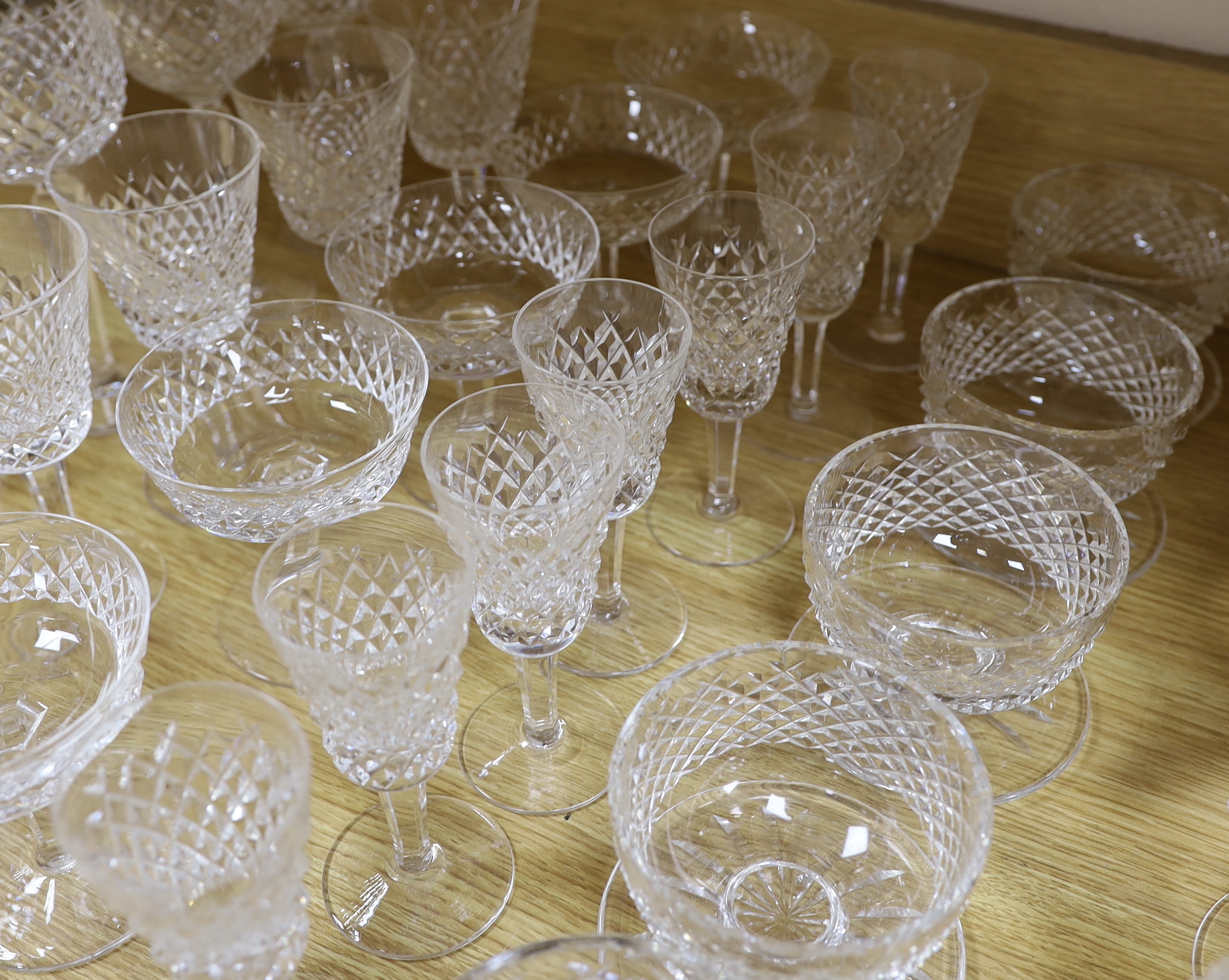 A part suite of Waterford drinking glassware, including champagne glasses, brandy glasses, liquor glasses, wine glasses, etc (61)